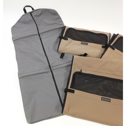 3791 - Five Victorinox suit carriers, the largest each 54cm wide