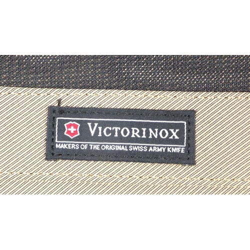 3791 - Five Victorinox suit carriers, the largest each 54cm wide