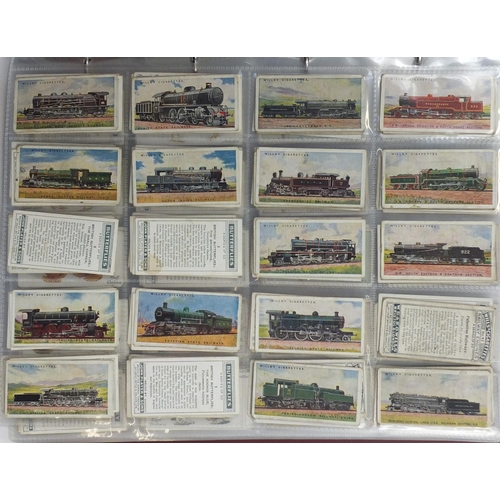 1262 - Collection of vintage cigarette cards, predominantly Players and Will's arranged in folders and albu... 