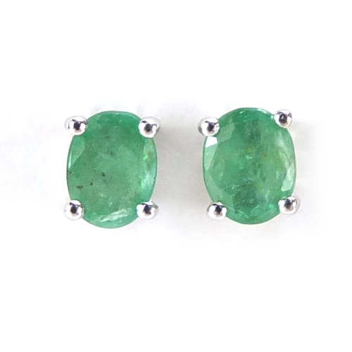 2370 - Pair of 9ct white gold emerald stud earrings, 5mm in length, 1.0g