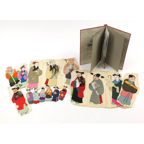 3730 - Vintage Chinese cut outs, some arranged in an album