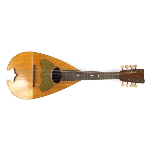 536 - Eight string melon shaped mandolin with case, inscribed Jupiter to the interior, 58.5cm in length