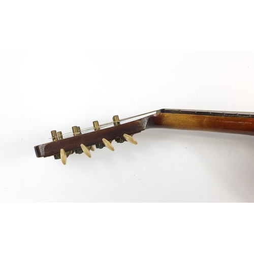 536 - Eight string melon shaped mandolin with case, inscribed Jupiter to the interior, 58.5cm in length