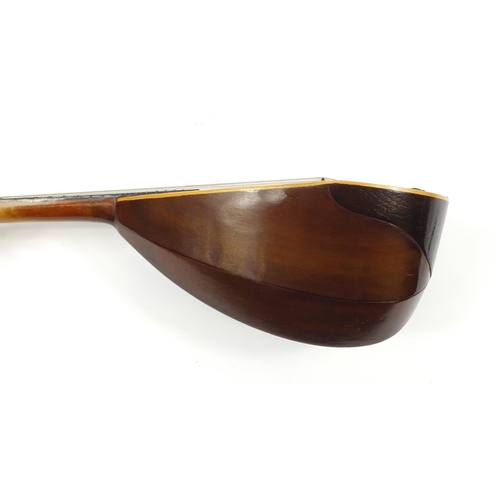 536 - Eight string melon shaped mandolin with case, inscribed Jupiter to the interior, 58.5cm in length