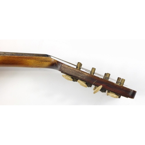 536 - Eight string melon shaped mandolin with case, inscribed Jupiter to the interior, 58.5cm in length