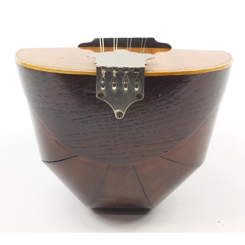 536 - Eight string melon shaped mandolin with case, inscribed Jupiter to the interior, 58.5cm in length