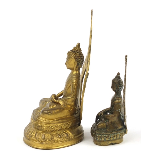 469 - Two figures of Buddha including a bronze example, possibly Thai or from Nepal, the largest 21.5cm hi... 