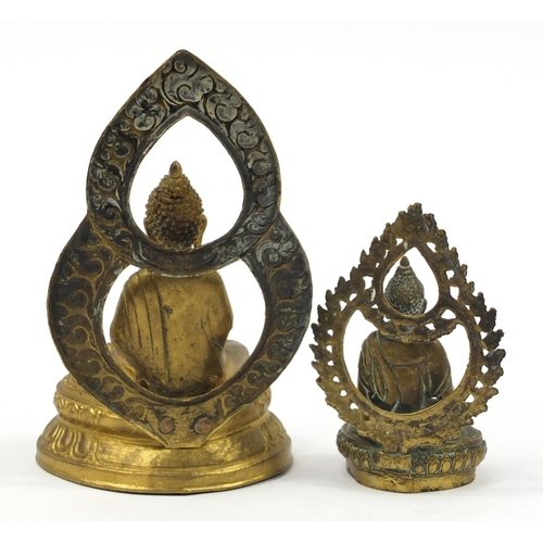 469 - Two figures of Buddha including a bronze example, possibly Thai or from Nepal, the largest 21.5cm hi... 