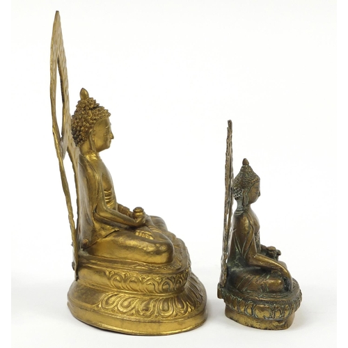 469 - Two figures of Buddha including a bronze example, possibly Thai or from Nepal, the largest 21.5cm hi... 