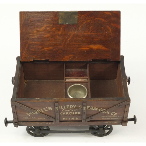 14 - 19th century railway interest advertising oak humidor in the form of a coal wagon, inscribed Powell'... 