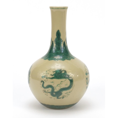 506 - Chinese porcelain vase hand painted in green with roundels of dragons below a ruyi head border, six ... 