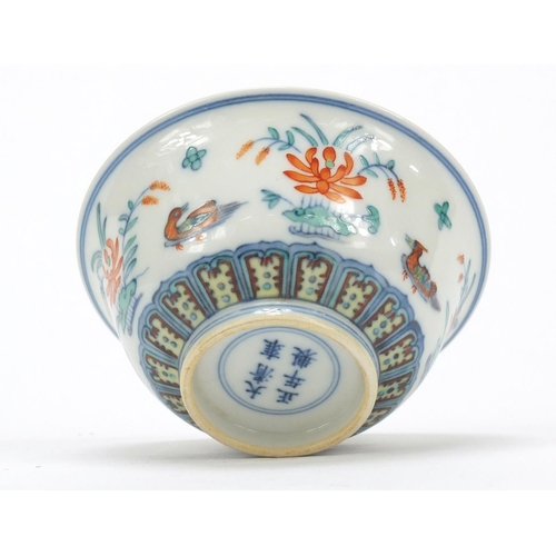 1157 - Chinese doucai porcelain bowl hand painted with ducks amongst flowers, six figure character marks to... 