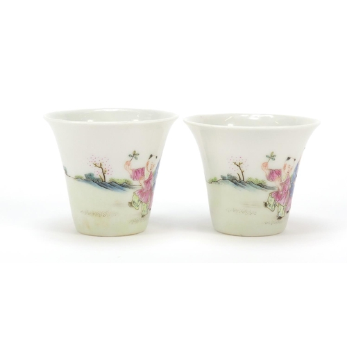 465 - Good pair of Chinese porcelain tea cups hand painted in the famille rose palette with children playi... 