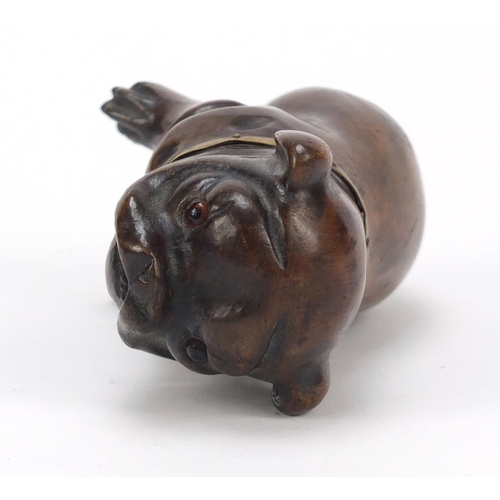 16 - Victorian carved treen Pug dog design inkwell with glass collar and ceramic liner, 11.5cm high