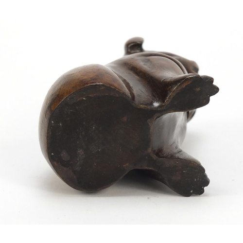 16 - Victorian carved treen Pug dog design inkwell with glass collar and ceramic liner, 11.5cm high