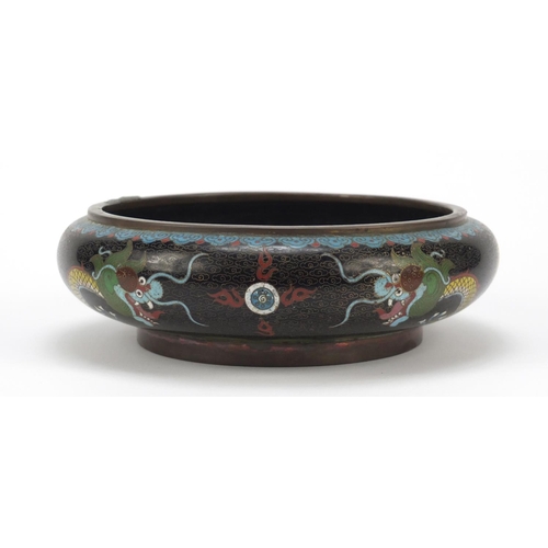 468 - Chinese cloisonné squatted bowl enamelled with dragons amongst clouds, 20cm in diameter