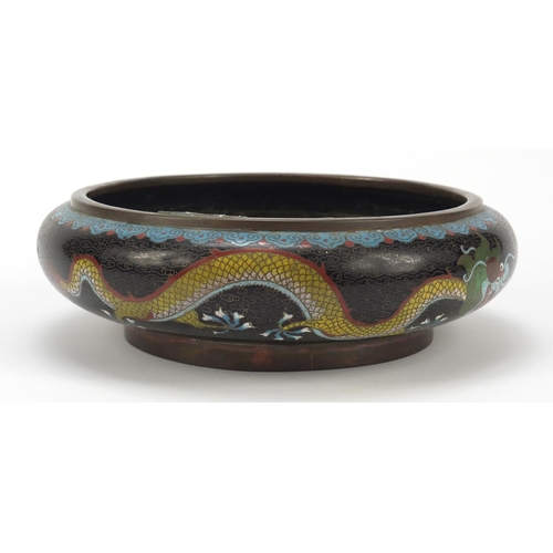 468 - Chinese cloisonné squatted bowl enamelled with dragons amongst clouds, 20cm in diameter