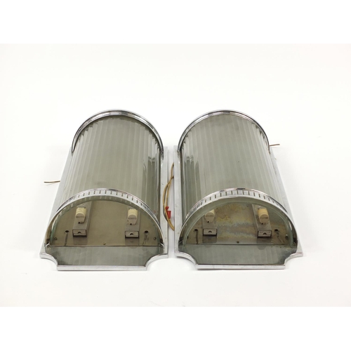 1504 - Pair of Art Deco design chrome wall lights with glass shades, each 47cm high x 24cm wide