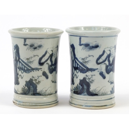 1159 - Pair of Chinese blue and white porcelain brush pots hand painted with figures in garden settings, ea... 