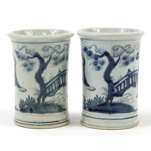 1159 - Pair of Chinese blue and white porcelain brush pots hand painted with figures in garden settings, ea... 