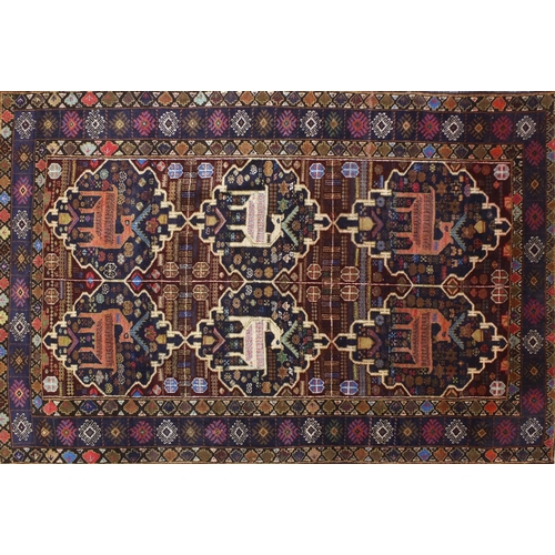 1476 - Rectangular Afghan Baluch rug decorated with a deer amongst flowers, 188cm x 123cm