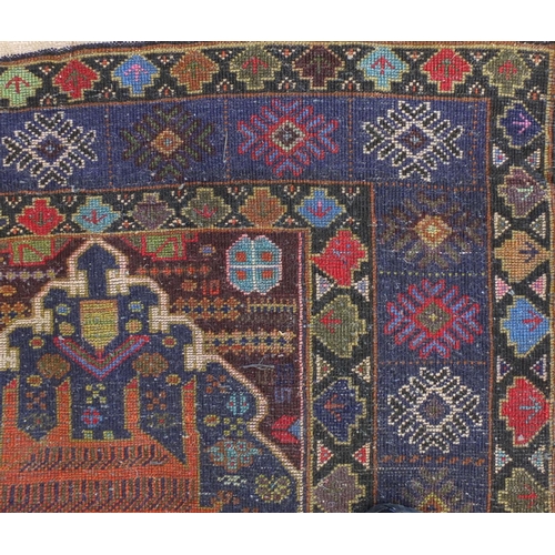 1476 - Rectangular Afghan Baluch rug decorated with a deer amongst flowers, 188cm x 123cm