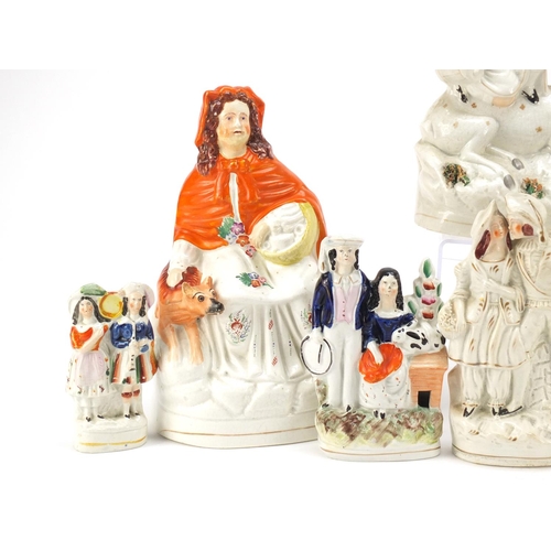 489 - Victorian Staffordshire including flat back figures, the largest 32cm high