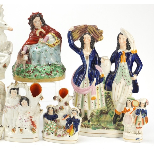 489 - Victorian Staffordshire including flat back figures, the largest 32cm high