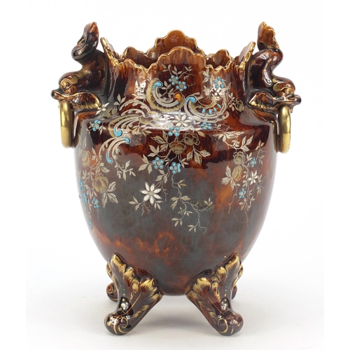 491 - Aesthetic treacle glazed cache pot with dolphin handles, hand painted and enamelled with stylised fl... 