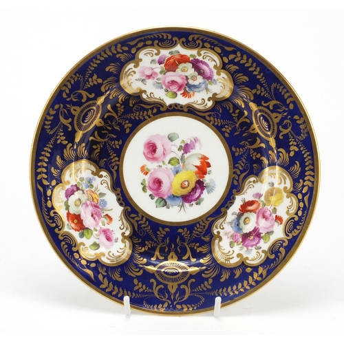 91 - 19th century Davenport cabinet plate hand painted and gilded flowers onto a cobalt ground, 22.5cm in... 