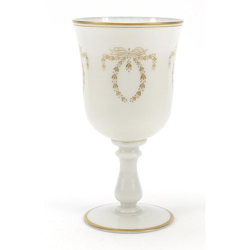 488 - Large Victorian milk glass goblet gilded with bows and swags, 25cm high