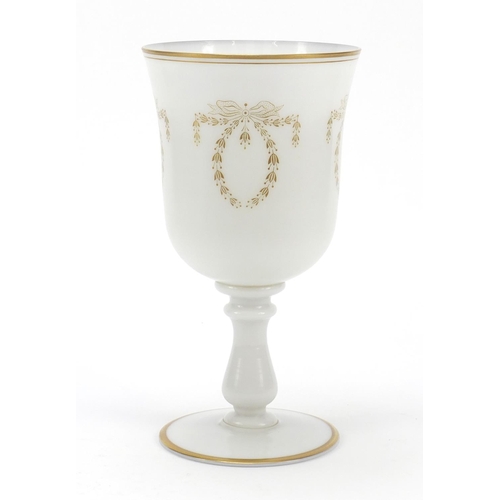 488 - Large Victorian milk glass goblet gilded with bows and swags, 25cm high