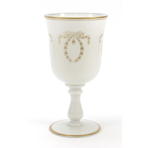 488 - Large Victorian milk glass goblet gilded with bows and swags, 25cm high