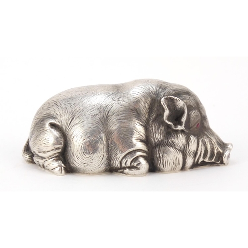 3068 - Russian silver model of a pig with pink glass eyes, impressed marks to the base, 9cm in length, 97.0... 