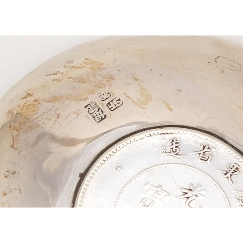 3087 - Chinese silver coin dish and a French silver dish, the largest 12.2cm in diameter, total 94.0g