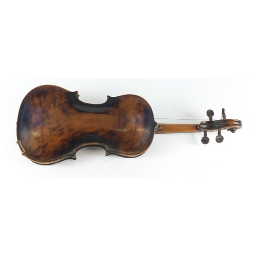 534 - Old wooden violin with scrolled neck, the violin back 14 inches in length