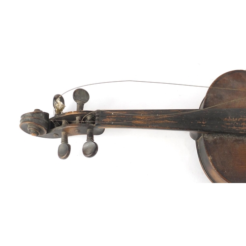 534 - Old wooden violin with scrolled neck, the violin back 14 inches in length