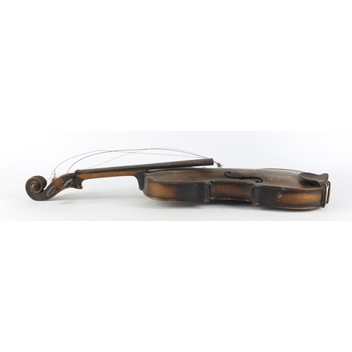 534 - Old wooden violin with scrolled neck, the violin back 14 inches in length