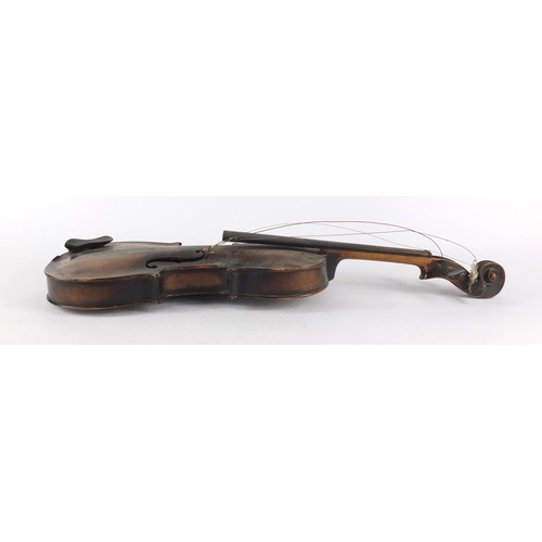 534 - Old wooden violin with scrolled neck, the violin back 14 inches in length