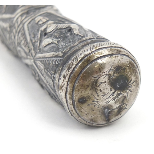 3080 - Burmese silver coloured metal walking stick handle embossed with deities, 23cm in length, 109.0g