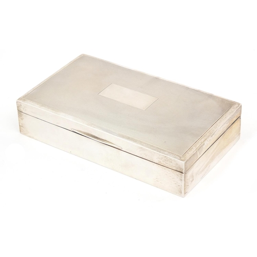 3037 - Harman Brothers, silver cigarette box, the hinged lid with engine turned decoration, Birmingham 1973... 