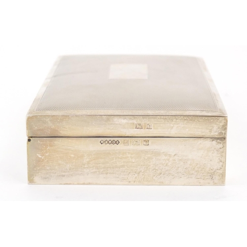 3037 - Harman Brothers, silver cigarette box, the hinged lid with engine turned decoration, Birmingham 1973... 