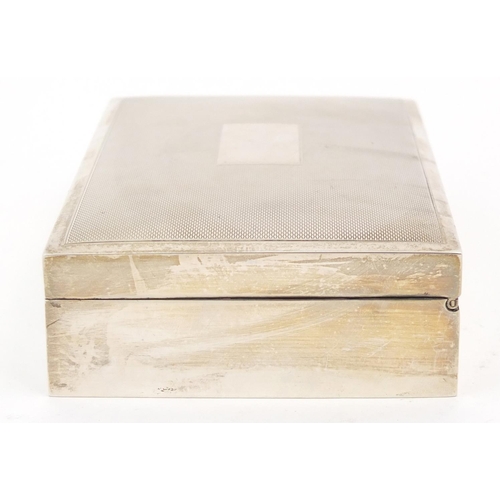 3037 - Harman Brothers, silver cigarette box, the hinged lid with engine turned decoration, Birmingham 1973... 