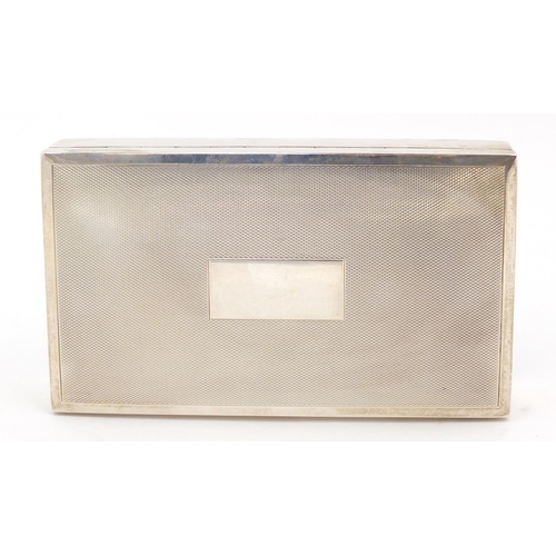 3037 - Harman Brothers, silver cigarette box, the hinged lid with engine turned decoration, Birmingham 1973... 