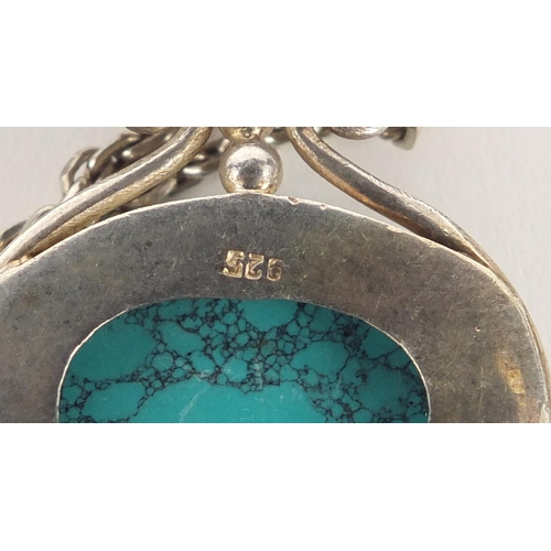 2372 - Three silver semi precious stone pendants on silver necklaces, 65.0g