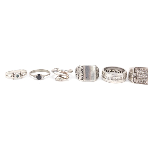 2306 - Ten silver rings, some set with semi precious stones, various sizes, 54.0g