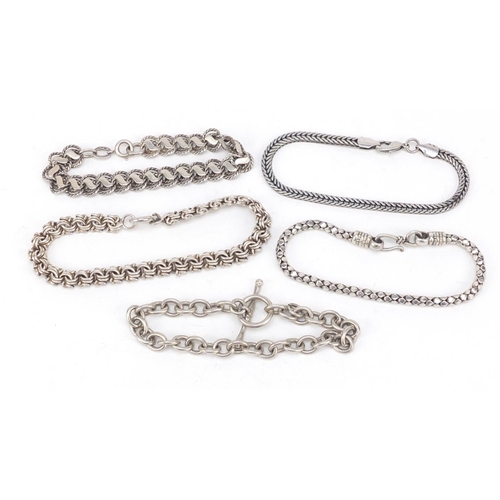 2399 - Five silver bracelets, 80.0g