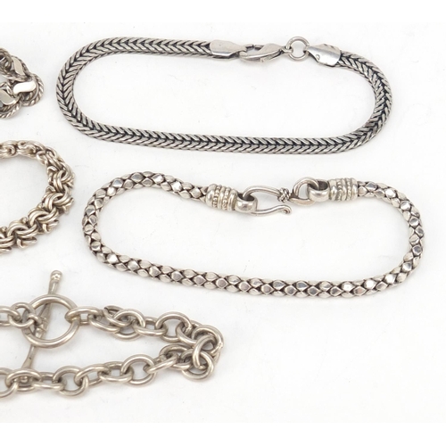 2399 - Five silver bracelets, 80.0g