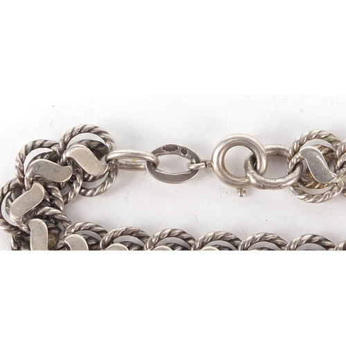 2399 - Five silver bracelets, 80.0g