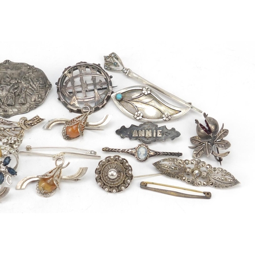 2403 - Victorian and later silver and white metal brooches, the largest 8cm in length, total 124.0g